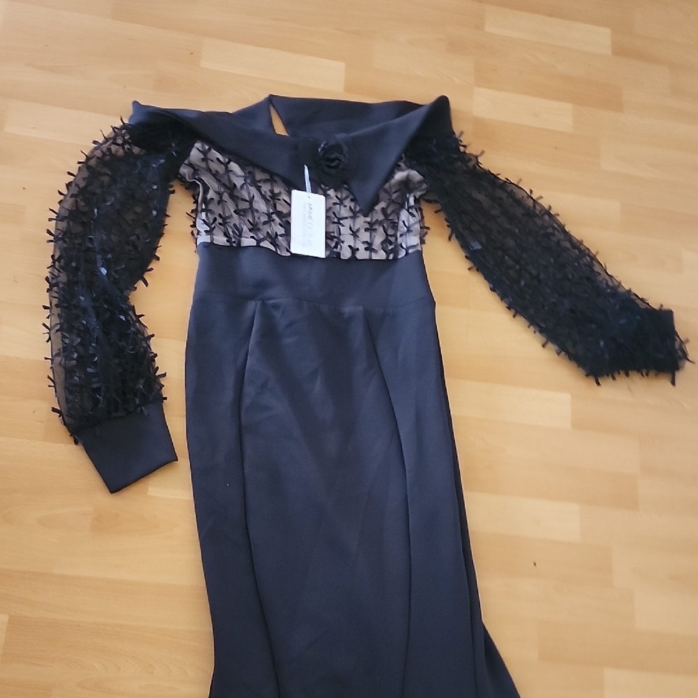 MNM Couture Elegant Black Dress with Textured Sleeves